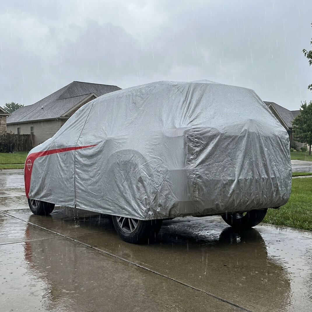 Split comparison: uncovered car soaked in rain versus covered car staying dry