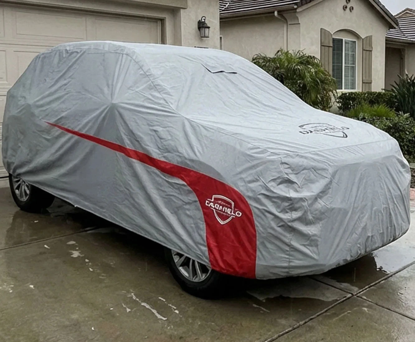 Ultimum Lite SUV cover fitted to a Toyota Highlander 2026, sitting flush along the roofline at sunset