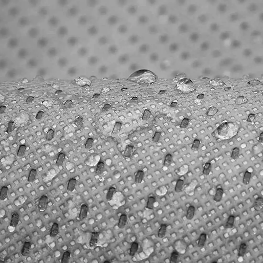 Macro of the WeatherTec HD weave with water beading on the surface