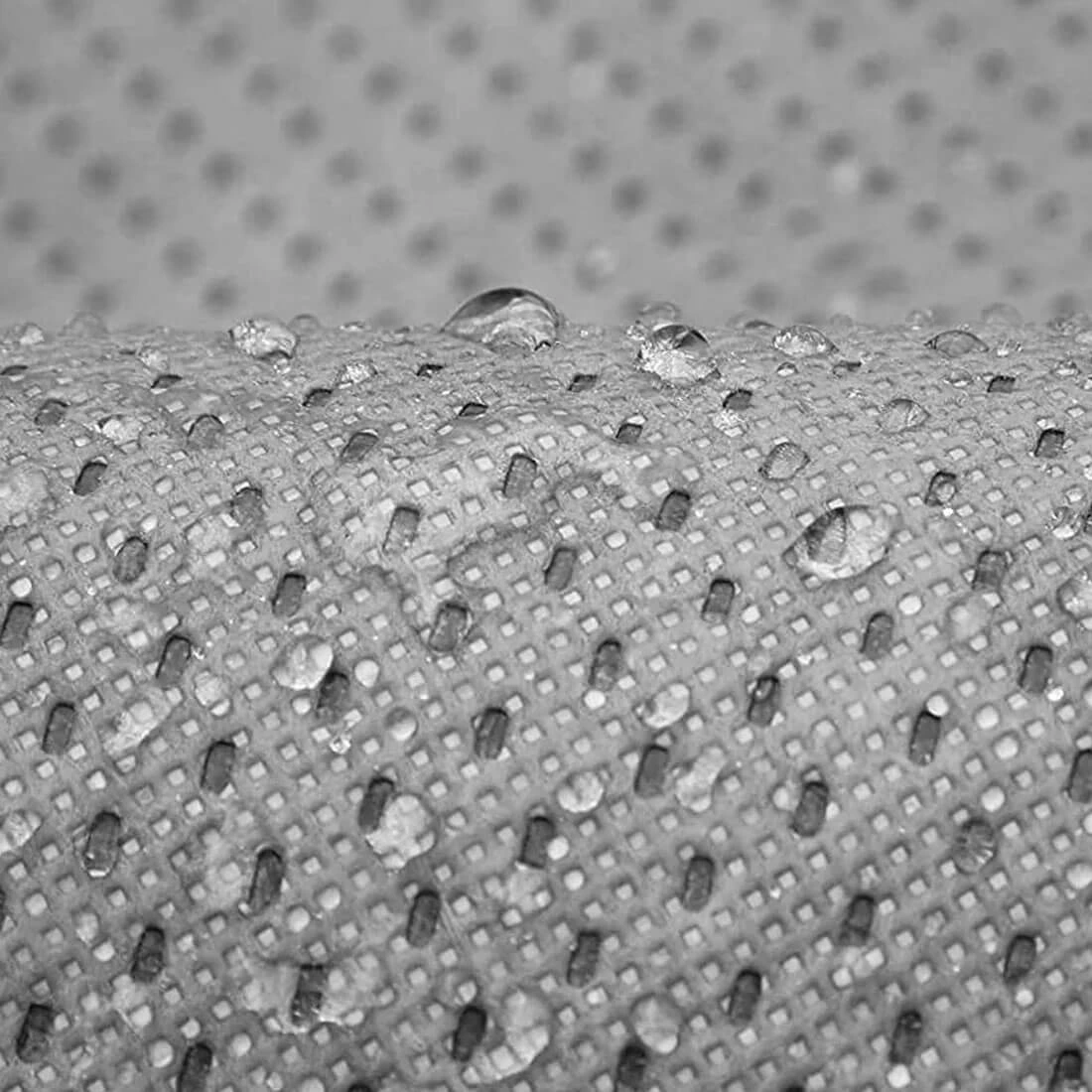Macro of the WeatherTec UHD weave with water beading on the surface