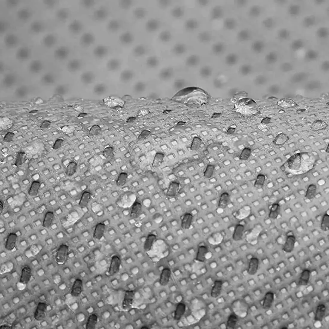 Macro of the WeatherTec HD weave with water beading on the surface