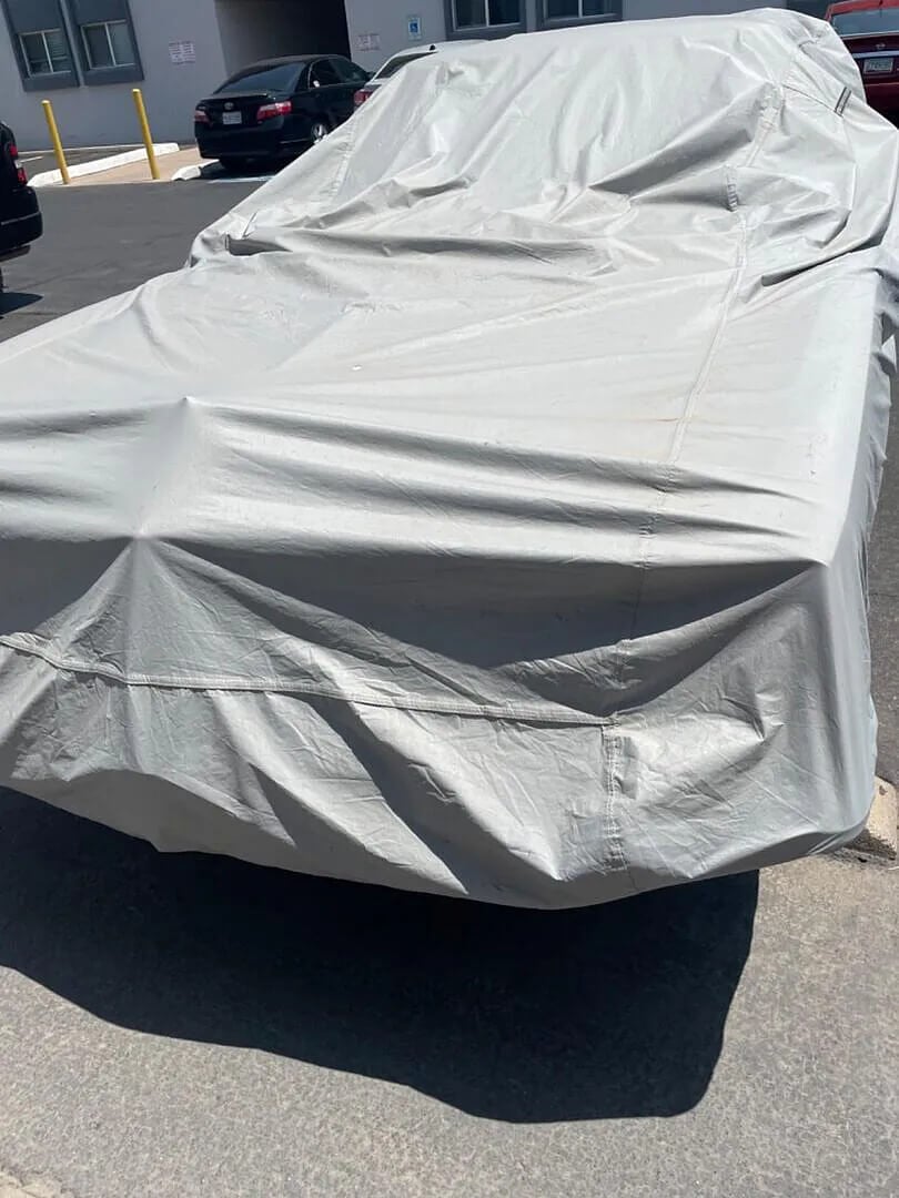 Customer photo: classic car covered outdoors in the Arizona sun