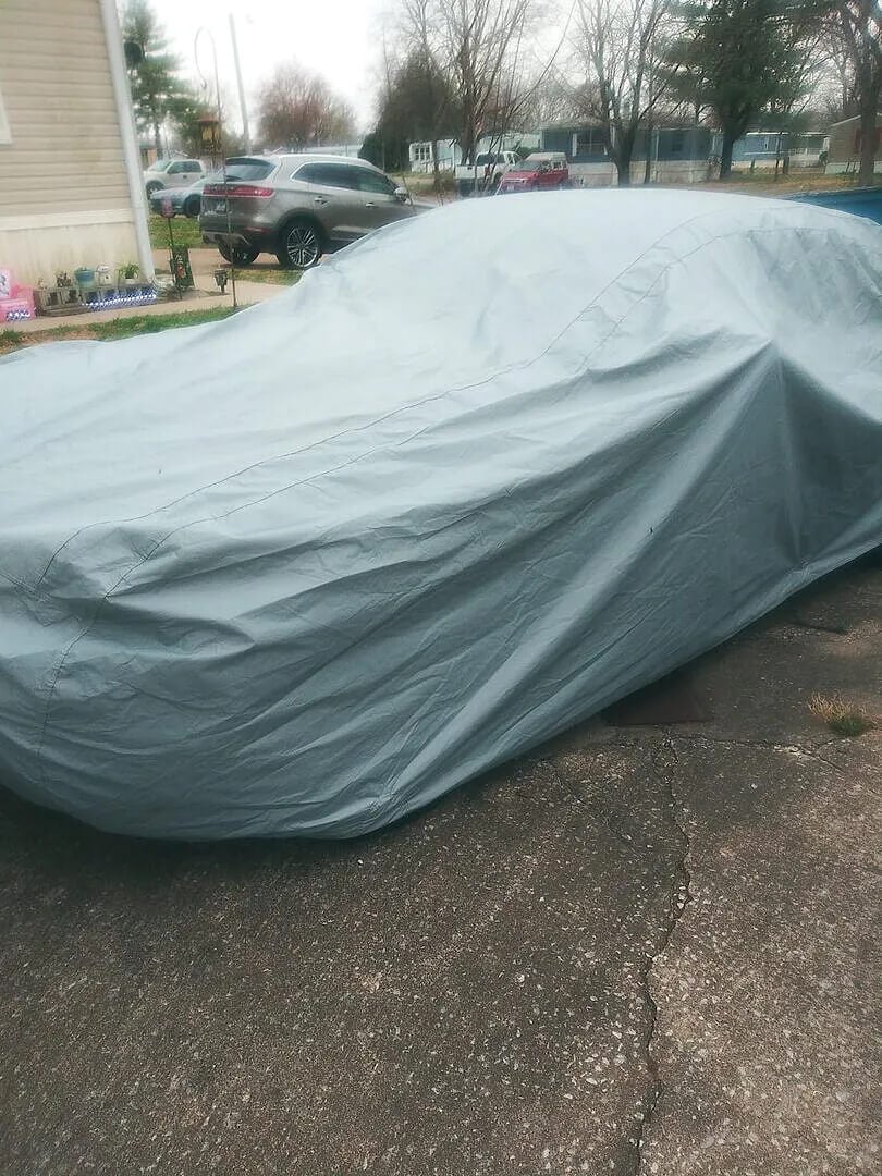 Customer photo: Mustang protected outdoors by a USCarCover car cover during hail